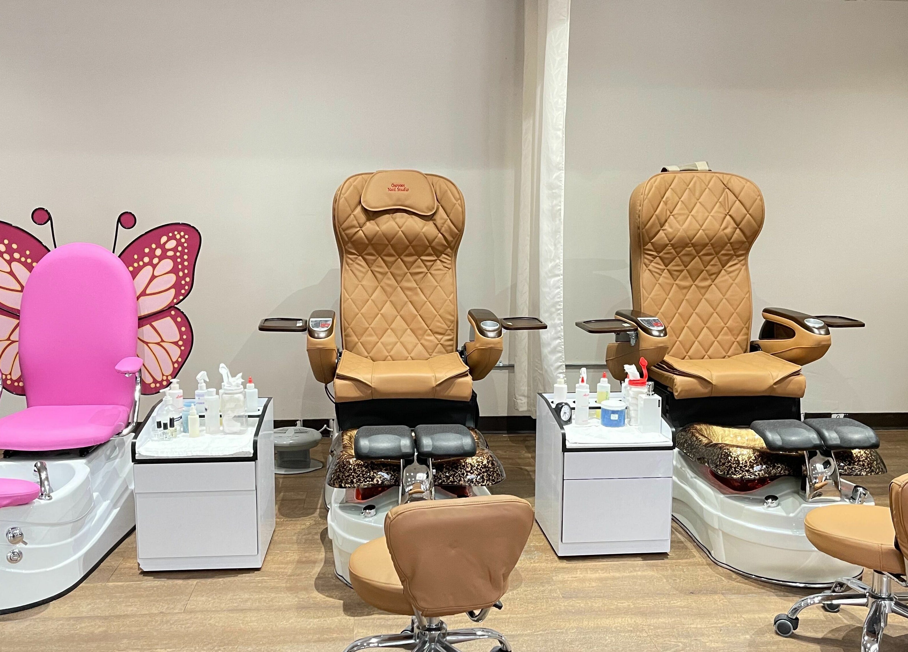 Stylish pink and tan pedicure chairs at Osoyoos Nail Studio, Osoyoos, British Columbia, CA.