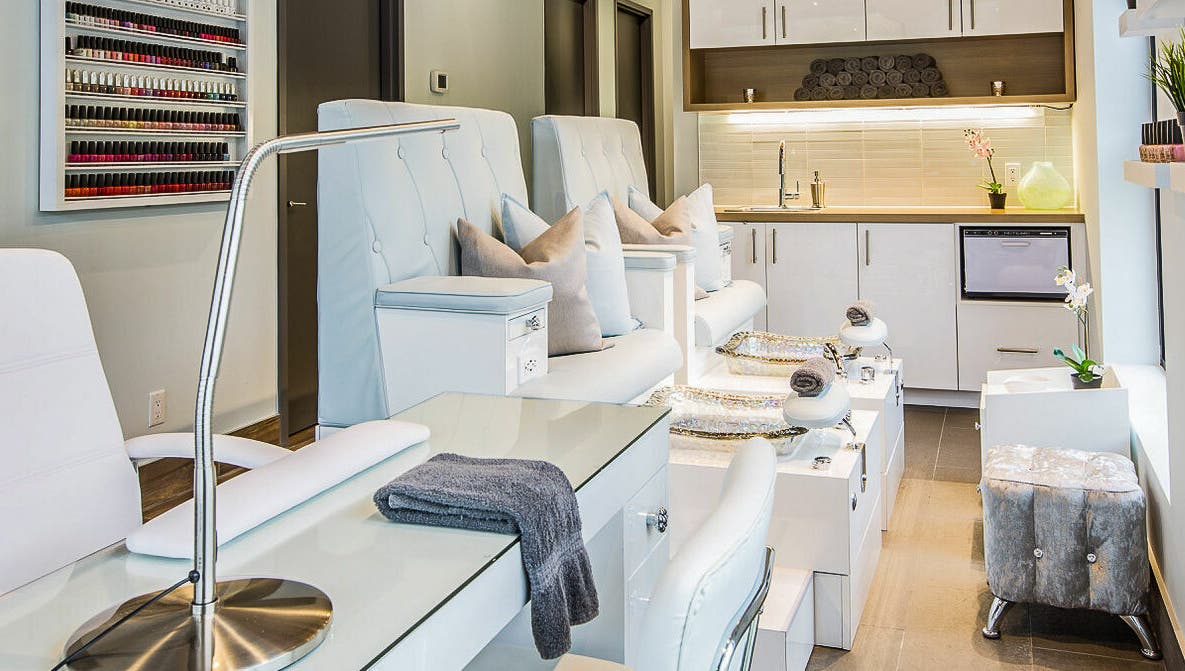 Elegant pedicure area at CedarHouse Spa in Mississauga, Ontario, CA, featuring plush seating and modern design.