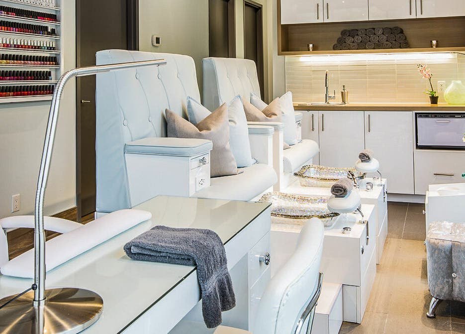 Elegant pedicure area at CedarHouse Spa in Mississauga, Ontario, CA, featuring plush seating and modern design.