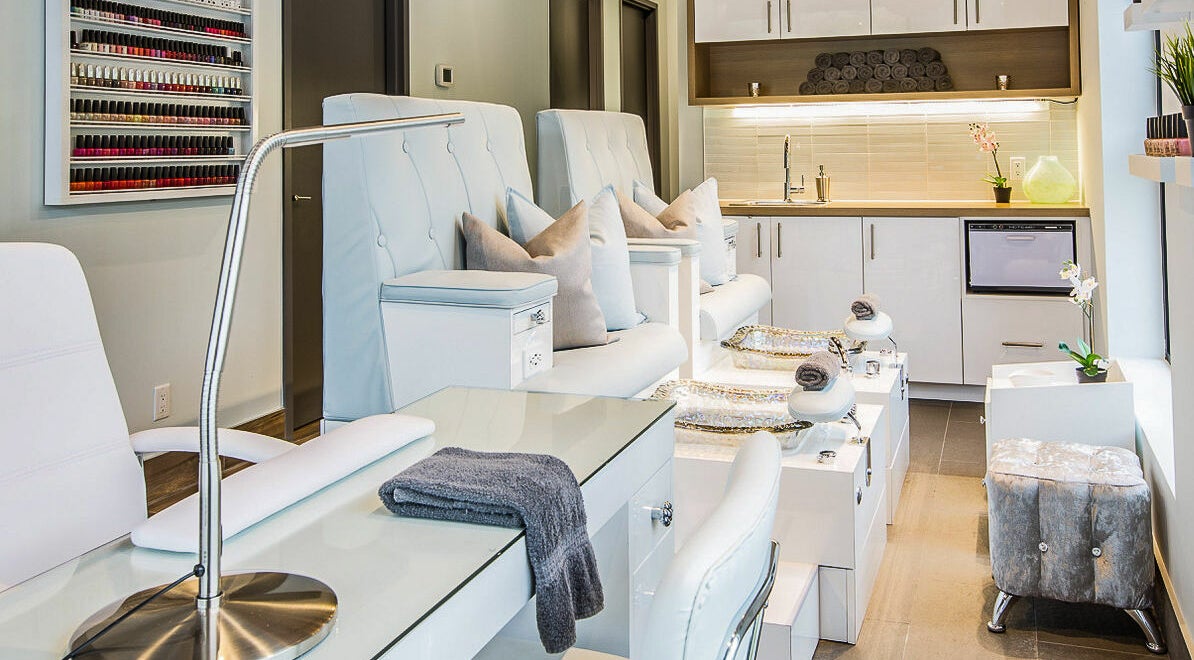 Elegant pedicure area at CedarHouse Spa in Mississauga, Ontario, CA, featuring plush seating and modern design.