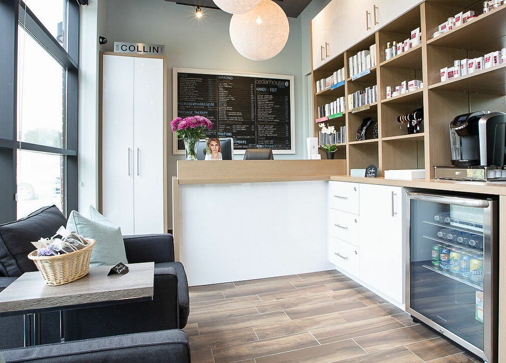 Welcoming reception area at CedarHouse Spa in Mississauga, Ontario, CA with cozy seating and elegant decor.