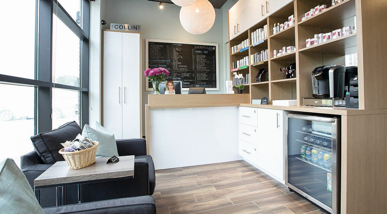 Welcoming reception area at CedarHouse Spa in Mississauga, Ontario, CA with cozy seating and elegant decor.