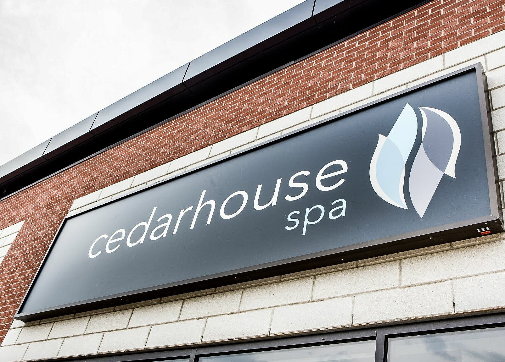 CedarHouse Spa front sign in Mississauga, Ontario, CA, highlighting the inviting entrance.