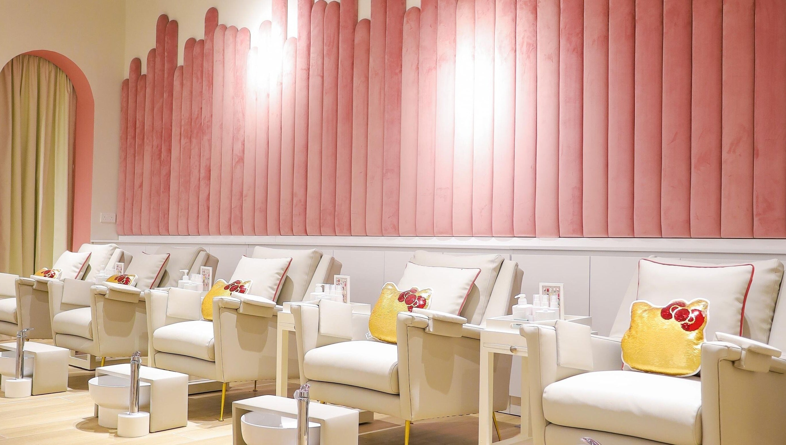 Elegant manicure chairs at Hello Kitty Beauty Spa Dubai, Dubai, Dubai, AE, with pink decor and Hello Kitty accents.