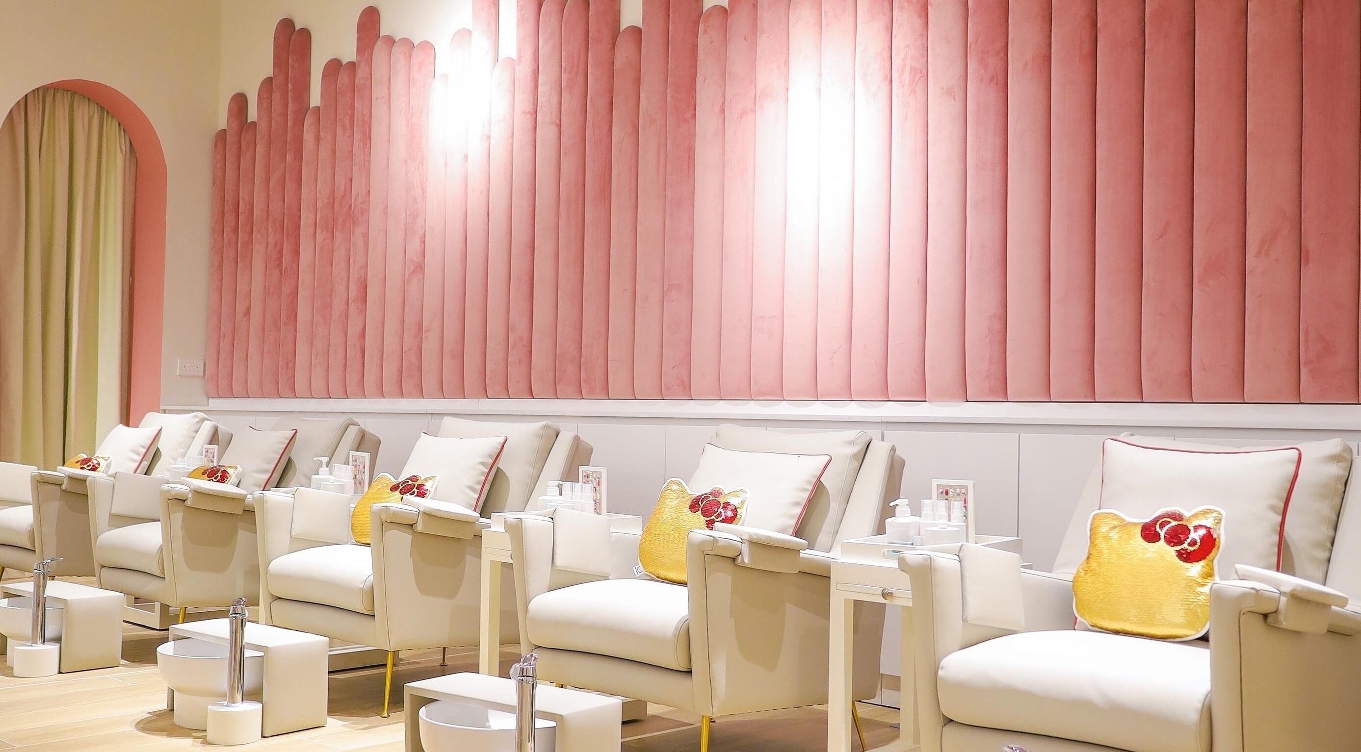 Elegant manicure chairs at Hello Kitty Beauty Spa Dubai, Dubai, Dubai, AE, with pink decor and Hello Kitty accents.