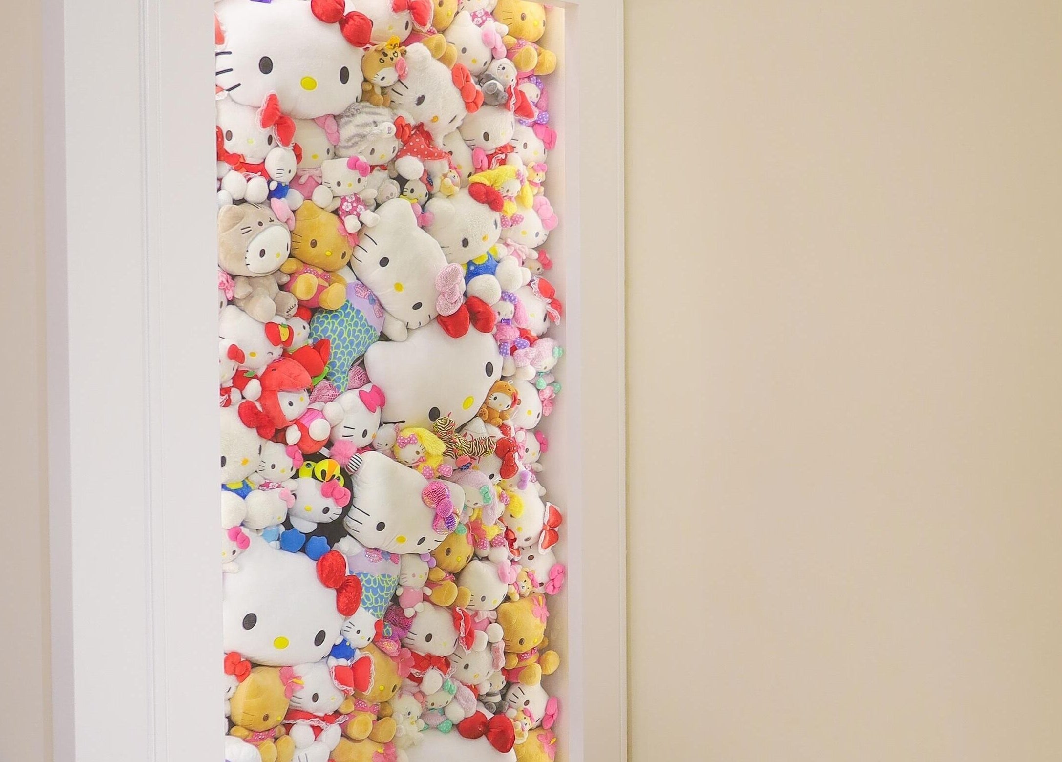 Hello Kitty plush wall at Hello Kitty Beauty Spa Dubai, Dubai, Dubai, AE, creating a playful, vibrant atmosphere.