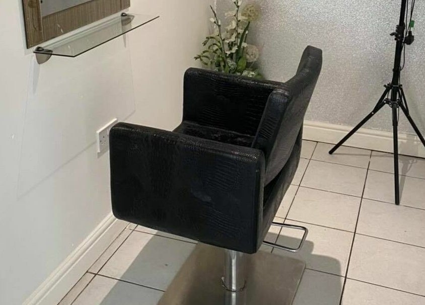 Sophisticated styling chair in The Hair Company, Codsall, England, GB, offering a serene beauty experience.