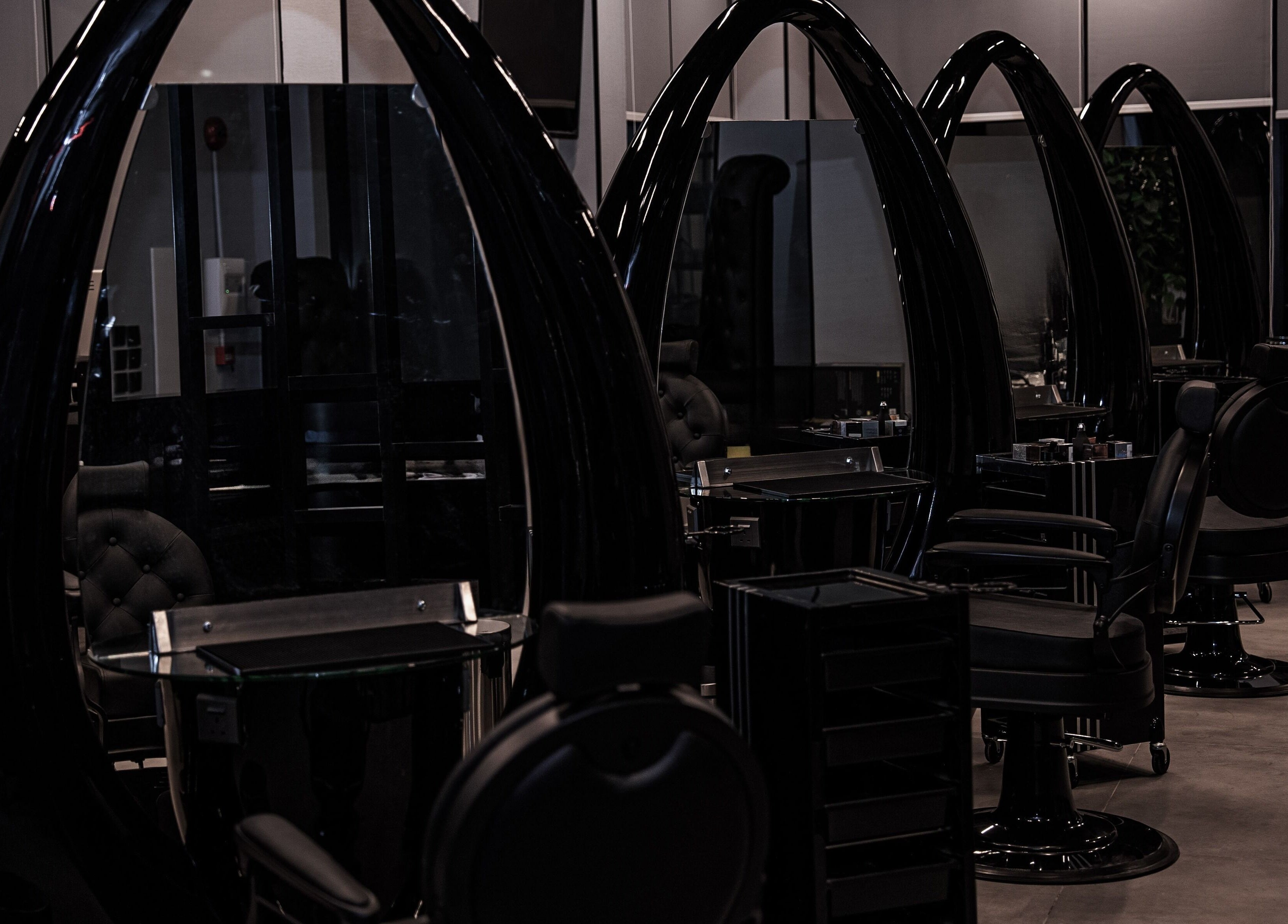 Elegant styling chairs at Toni Vayz | Men | Elite Lounge Shorofat Park, Shorofat Park, SA, showcasing modern design.