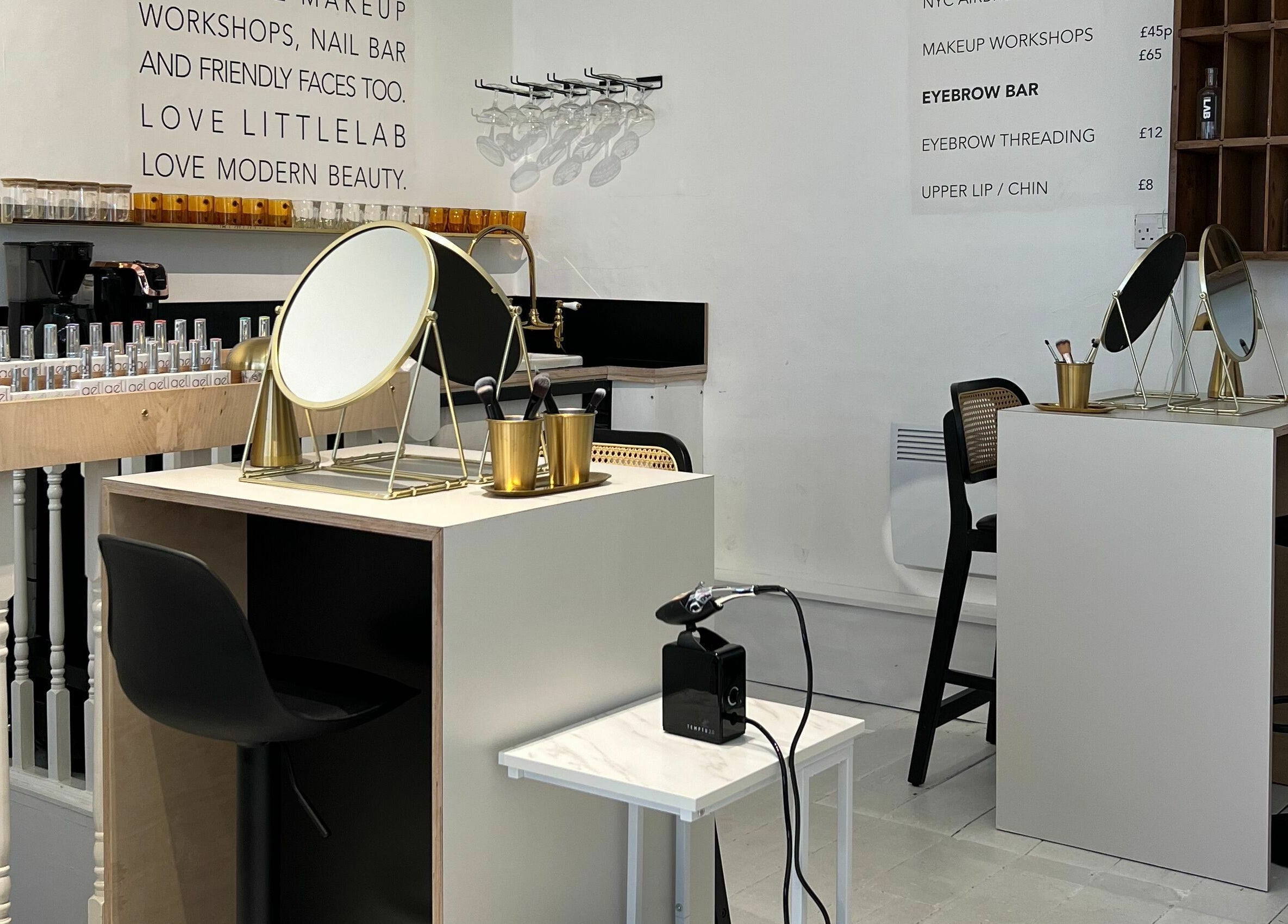 Modern beauty studio at LittleLAB, Bath, England, GB, showcasing chic makeup stations and elegant décor.