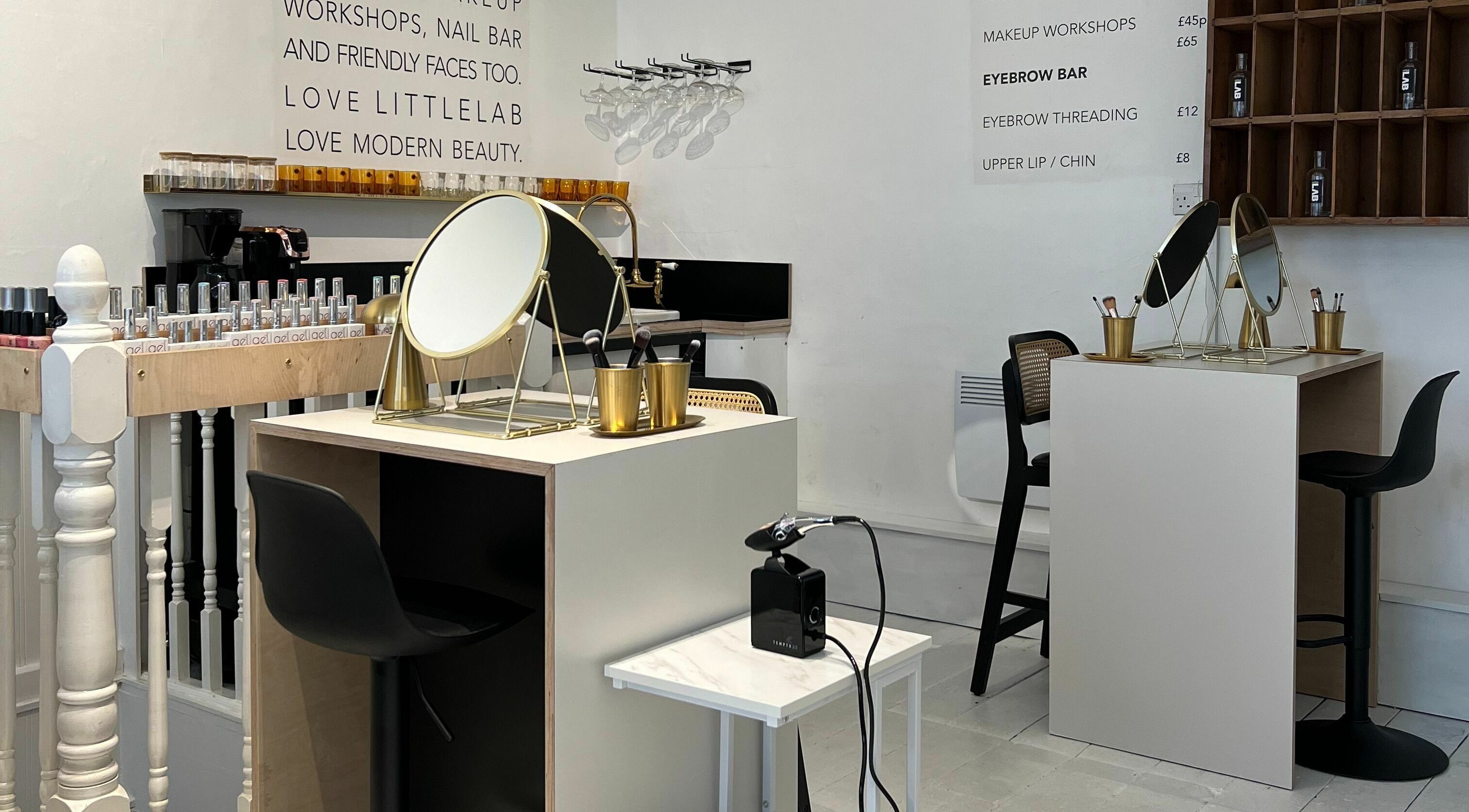 Modern beauty studio at LittleLAB, Bath, England, GB, showcasing chic makeup stations and elegant décor.