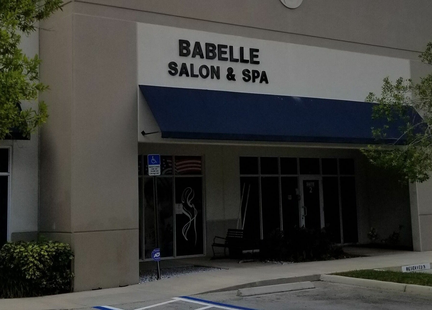 Entrance of Babelle Salon and Spa in Pompano Beach, Florida, US showcasing a welcoming facade.