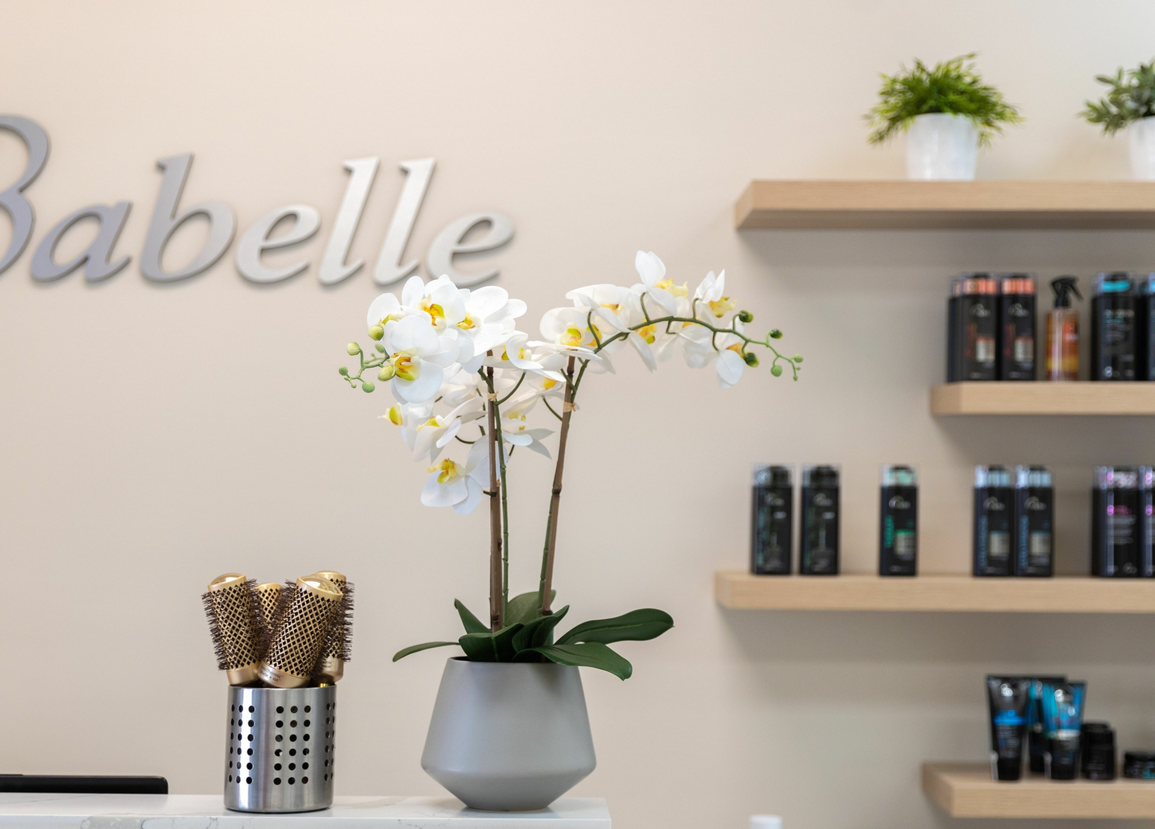 Sophisticated interior of Babelle Salon and Spa, Pompano Beach, Florida, US with orchid and beauty products.