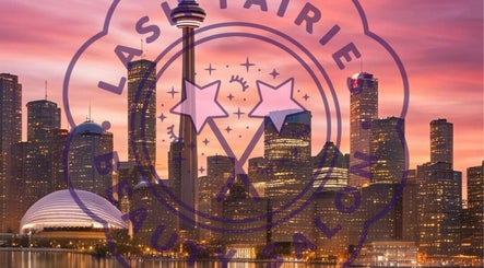 Lash Fairies Toronto logo over skyline at sunset, Toronto, Ontario, CA.