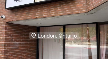 Exterior of Lash Fairies Toronto on London Road, Toronto, Ontario, CA, showing brick facade and signage.