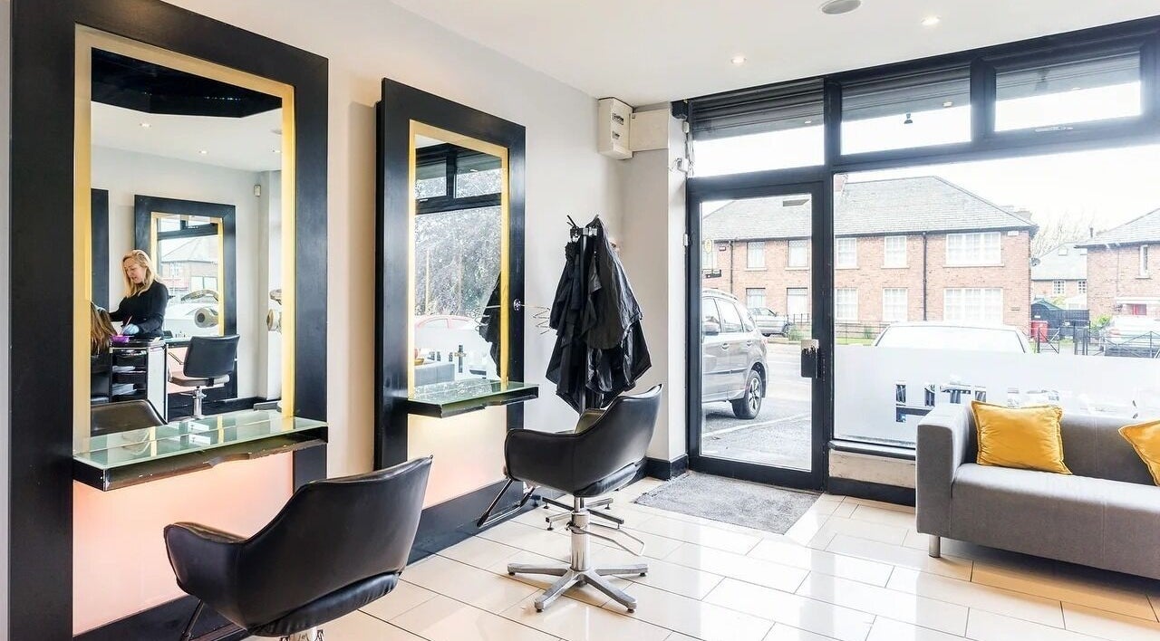 Stylish interior of Salon Nova in Dublin, County Dublin, IE with modern chairs and mirrors.