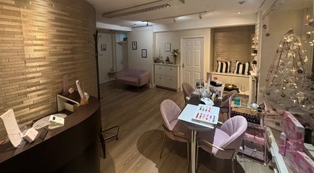 Inviting lounge area at Beauty Within, Cheadle, England, GB with stylish decor and a calming atmosphere.