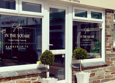 Front view of Salon in the Square in Mawnan Smith, England, showcasing its elegant entrance.