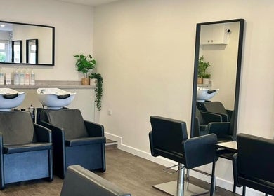 Elegant salon chairs and mirrors at Salon in the Square, Mawnan Smith, England, GB, offering modern beauty services.