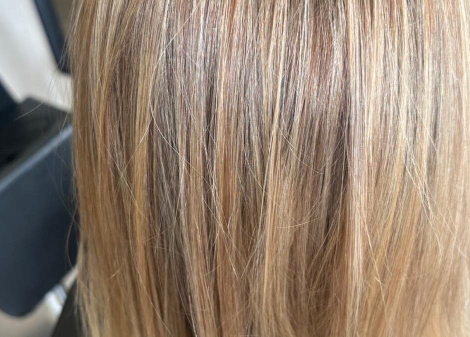 Blonde hair highlights at Salon In The Square, Mawnan Smith, England, GB, showcasing sleek finish.