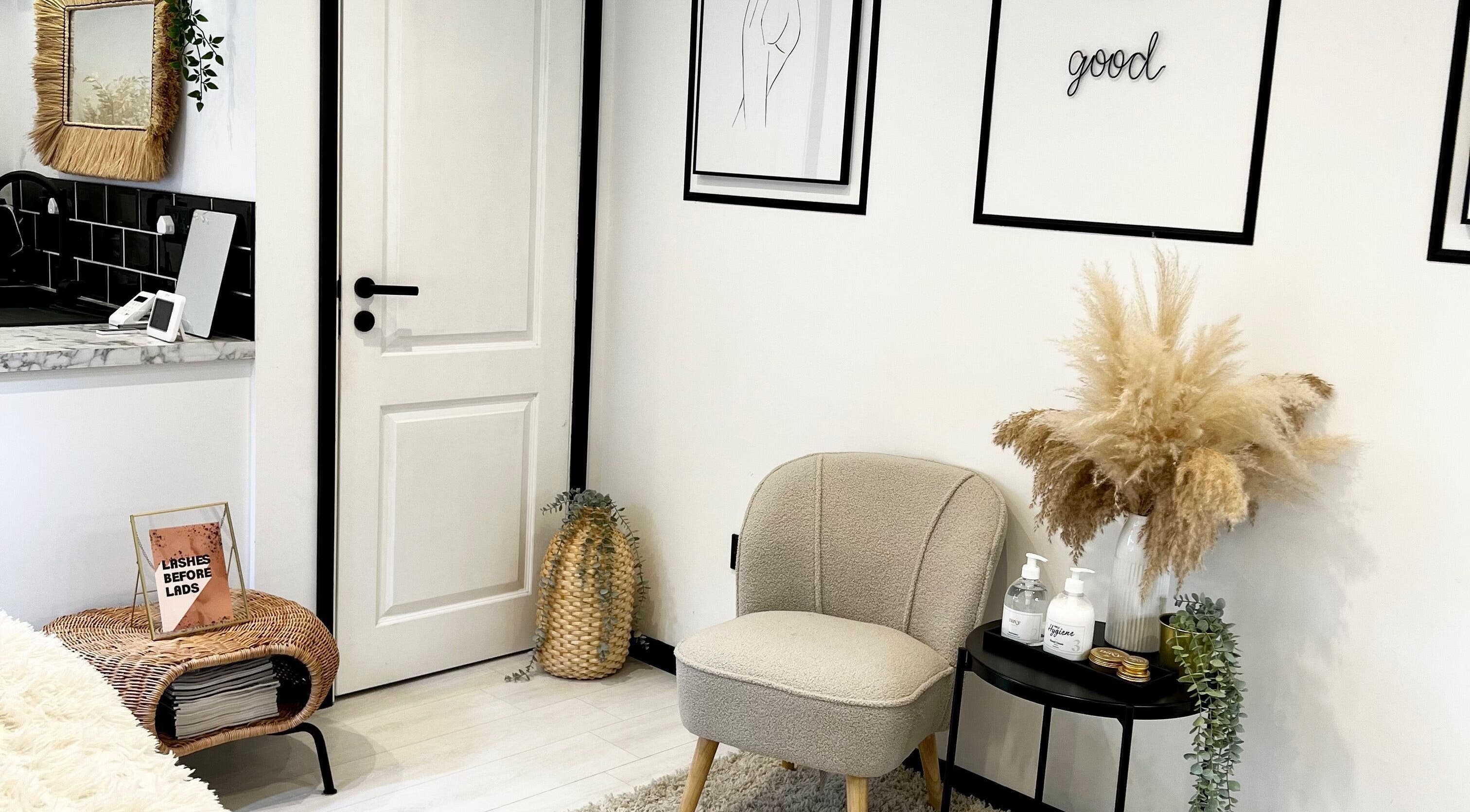 Chic seating area at Lash Love Aimee in Burgess Hill, England, GB, featuring stylish decor and relaxing ambiance.