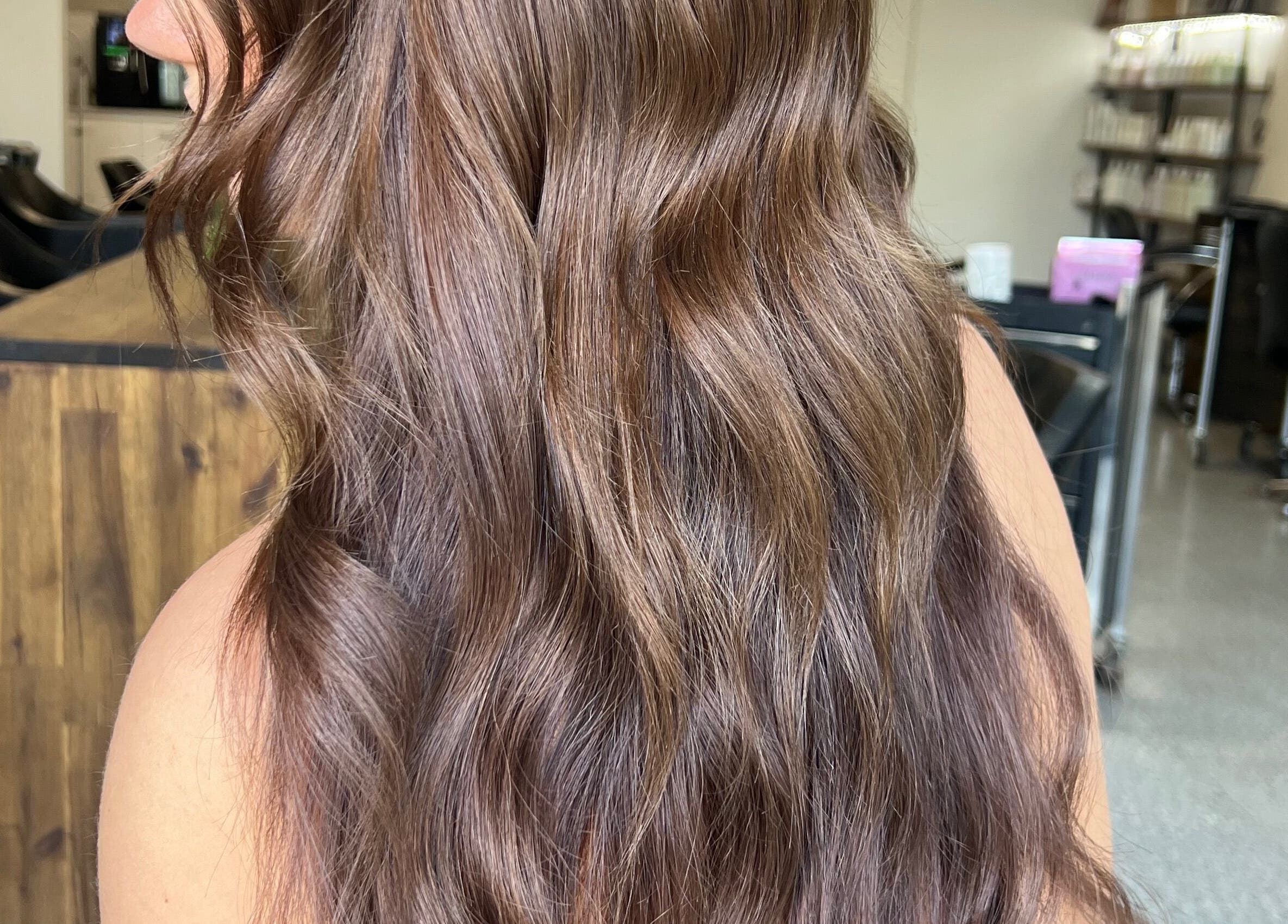 Luscious wavy hairstyle at Bella Beautiful, Mawson Lakes, South Australia, AU. Experience premium hair care.