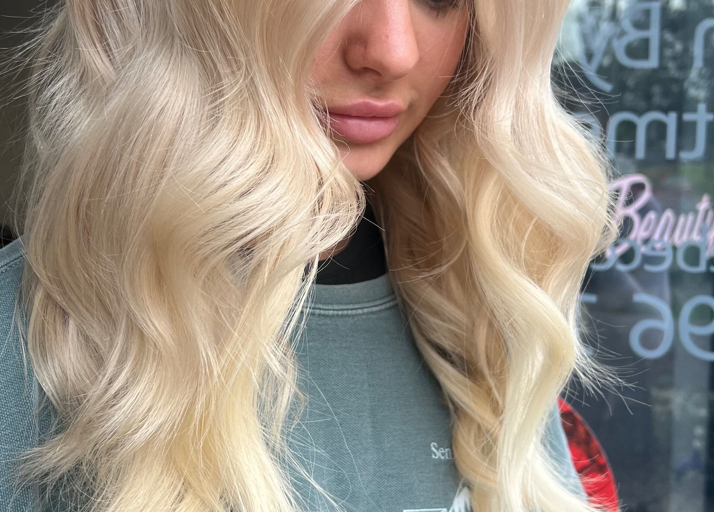 Elegant blonde waves styled at Bella Beautiful, Mawson Lakes, South Australia, AU.