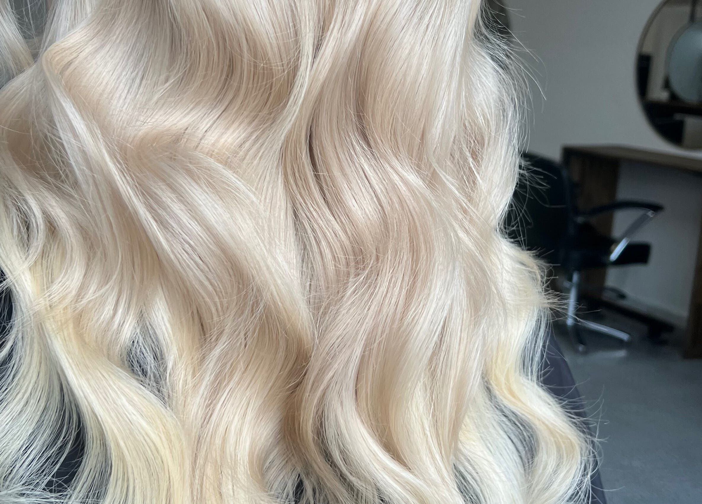 Luxurious blonde waves styled at Bella Beautiful, Mawson Lakes, South Australia, AU salon.