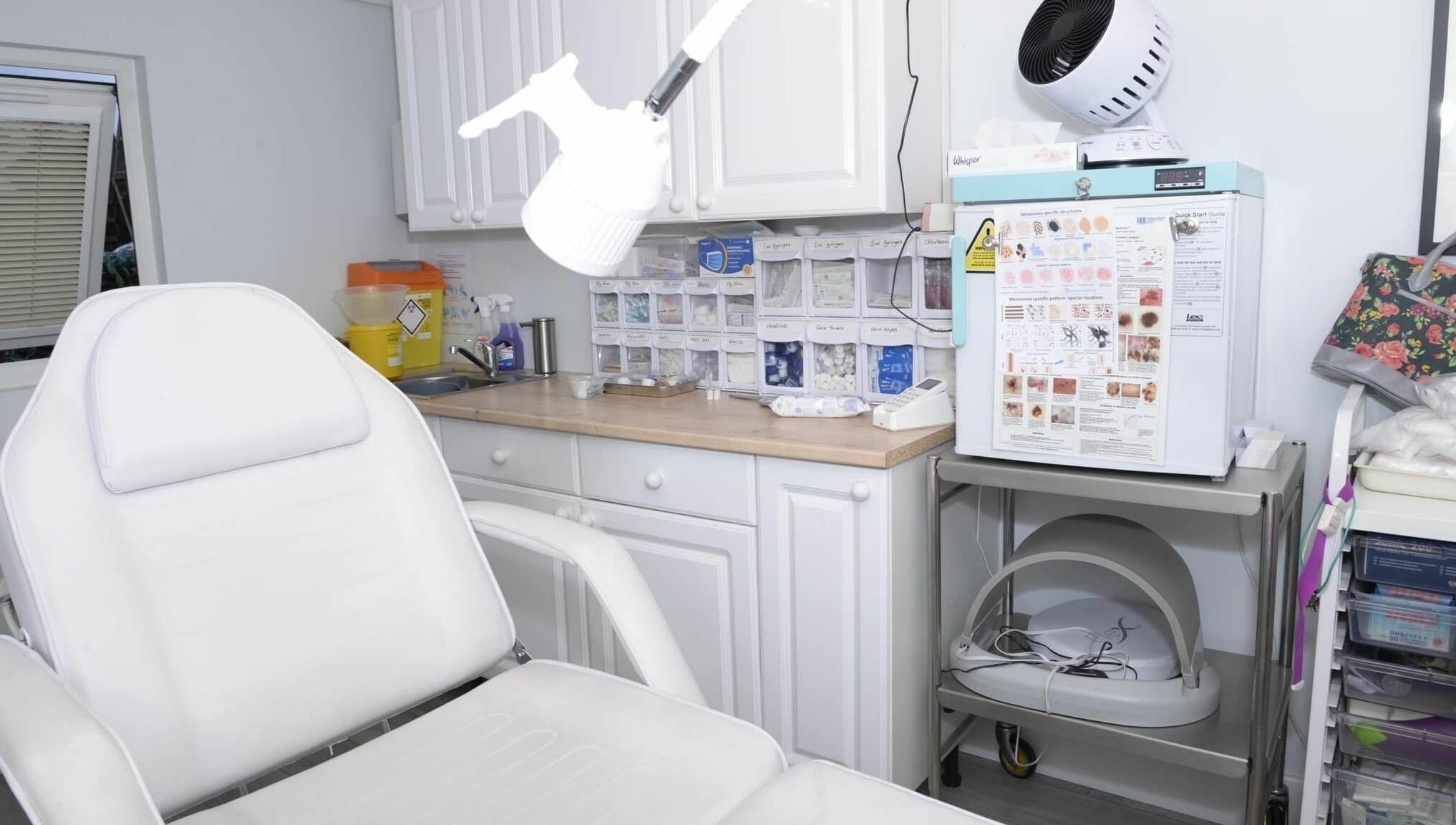 A modern and clean treatment room at Tocolo Ltd, Abbots Langley, England, GB, featuring a comfortable white chair.