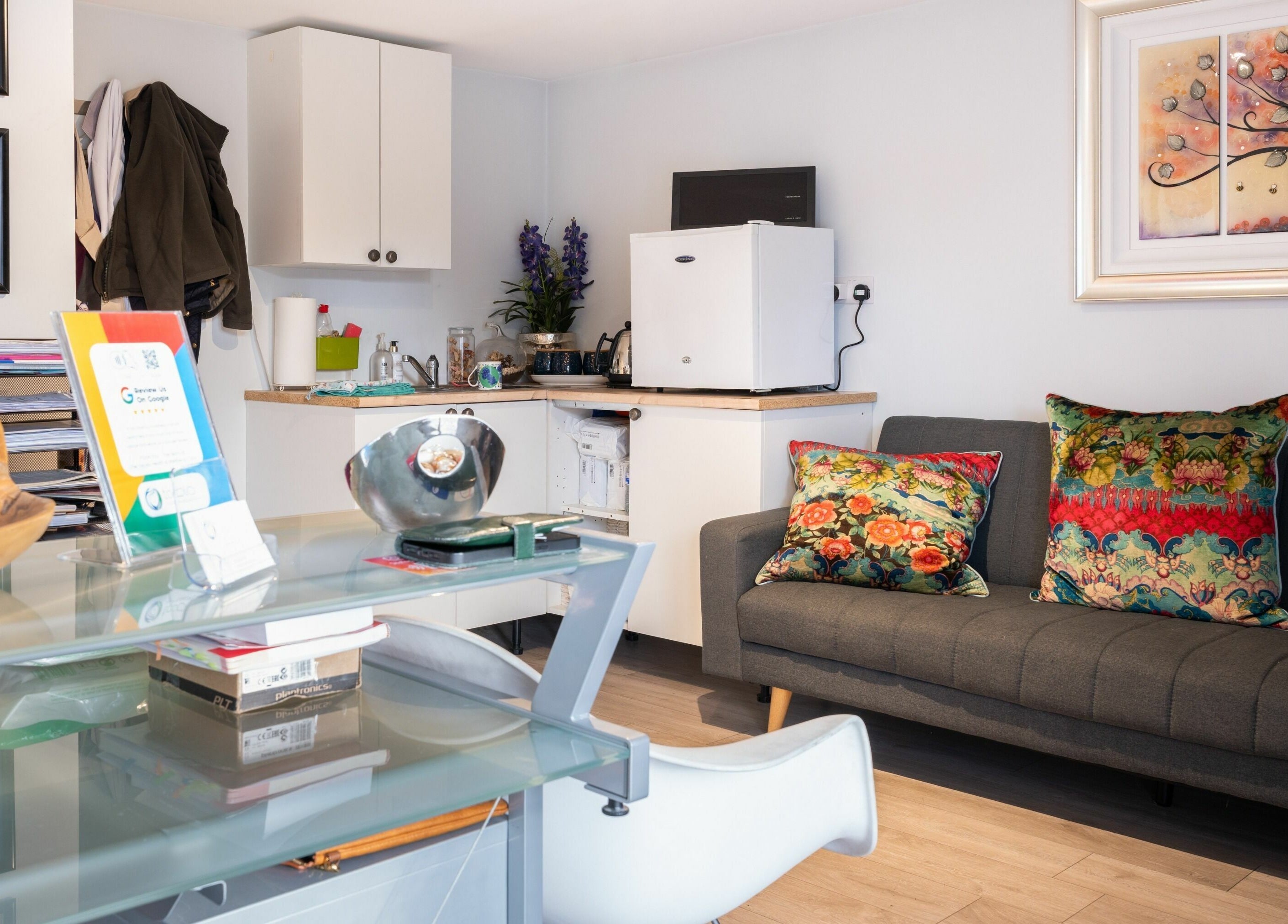 Stylish reception area at Tocolo Ltd, Abbots Langley, England. Cozy sofa and vibrant decor create a welcoming ambiance.