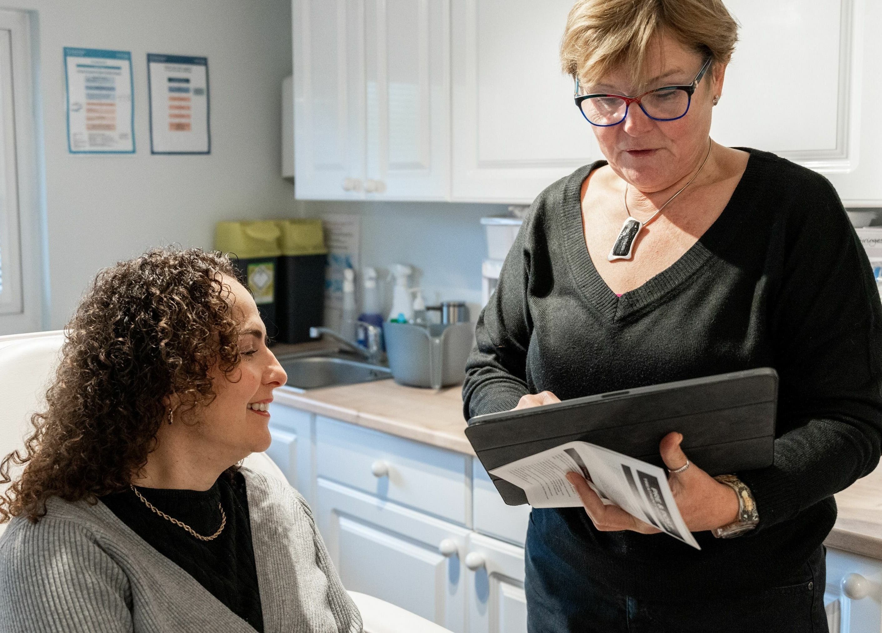 Client and consultant in wellness session at Tocolo Ltd, Abbots Langley, England, GB.