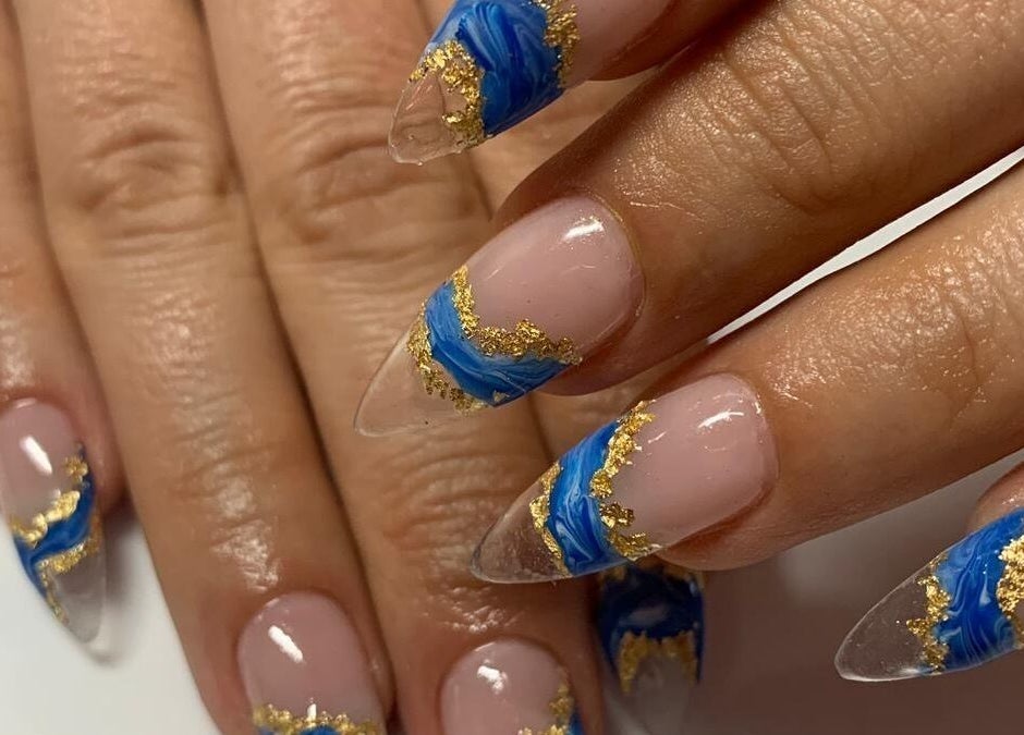 Stunning blue and gold nail art at MatNails Beauty The St. Botolph Building, London, England, GB.