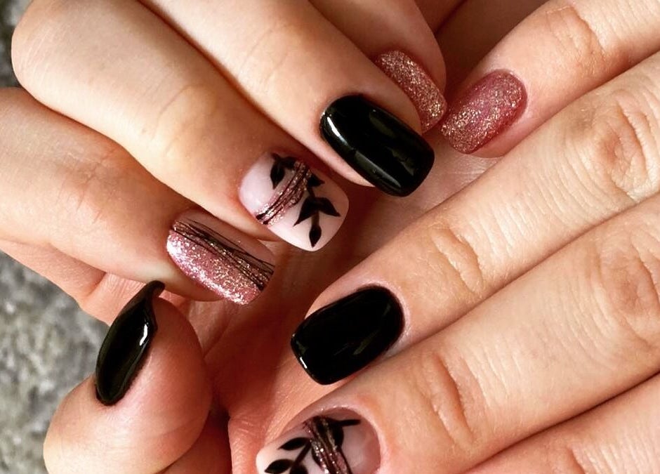 Elegant nail art at MatNails Beauty The St. Botolph Building in London, England, GB with glitter and black designs.