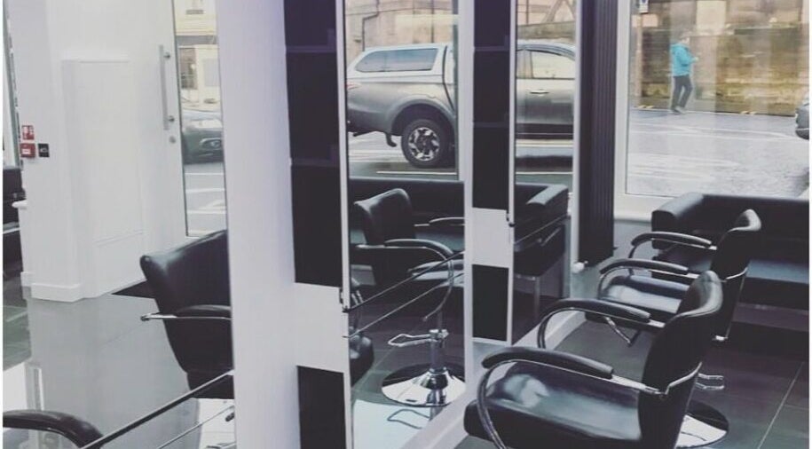 Modern salon chairs at Justine Louise Hair, Beauty and Aesthetics in Edinburgh, Scotland, GB.