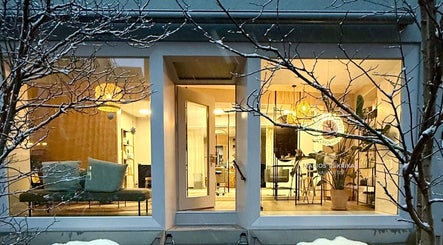 Warm, inviting view of Marios Tsikrikas Hair Artist in Zürich, Zürich, CH with modern decor and cozy ambiance.