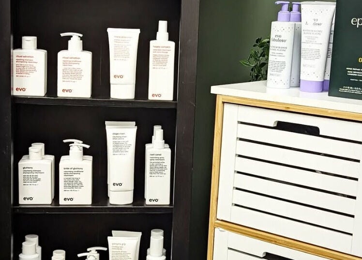 Evo products displayed on shelf at Incantation Beauty Studio, Calgary, Alberta, CA for beauty treatments.