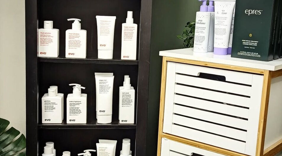 Evo products displayed on shelf at Incantation Beauty Studio, Calgary, Alberta, CA for beauty treatments.