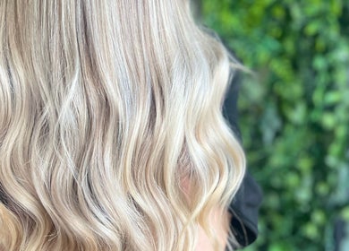 Lustrous blonde waves styled at Swift Hair & Beauty By Natalya in Bangor, Northern Ireland, GB.