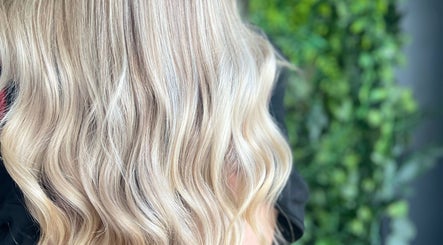 Lustrous blonde waves styled at Swift Hair & Beauty By Natalya in Bangor, Northern Ireland, GB.