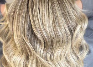 Blonde wavy hair styled at Swift Hair & Beauty By Natalya in Bangor, Northern Ireland, GB.