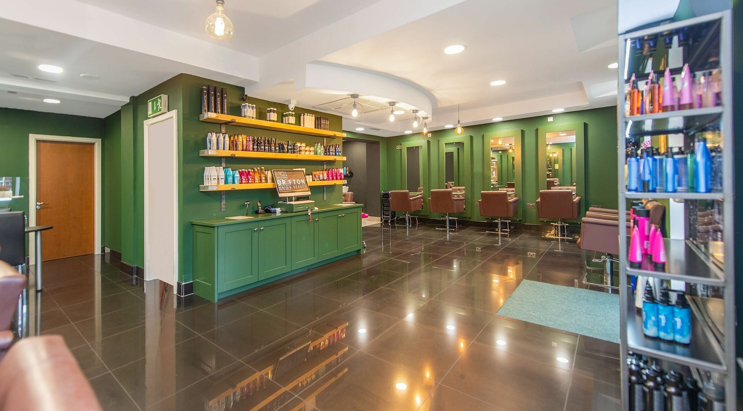 Modern salon interior of Grafton Hair and Beauty in Galway, County Galway, IE, featuring stylish decor and products.