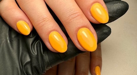 Vibrant yellow manicure at True Nails, Glasgow, Scotland, GB.