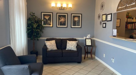 Relaxed seating area with stylish decor at Zhenni Spa, Murfreesboro, Tennessee, US.