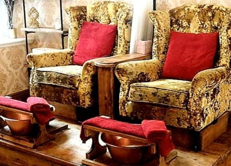 Luxurious seating at Gilded Dreams, Carnforth, England, GB, offering a plush spa experience.