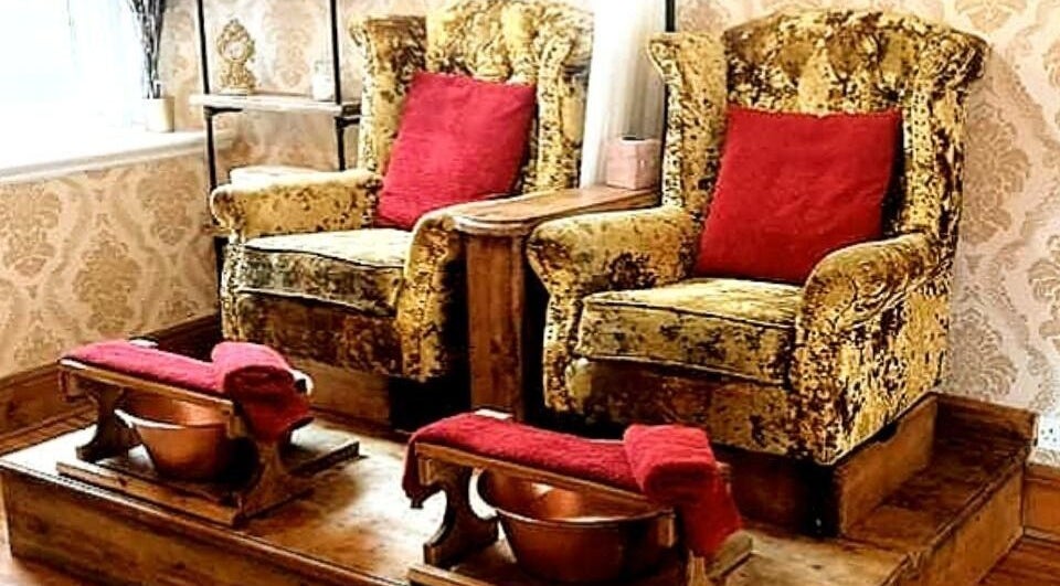 Luxurious seating at Gilded Dreams, Carnforth, England, GB, offering a plush spa experience.