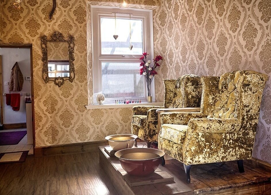 Luxurious velvet chairs in Gilded Dreams, Carnforth, England, GB enhance the relaxing spa atmosphere.