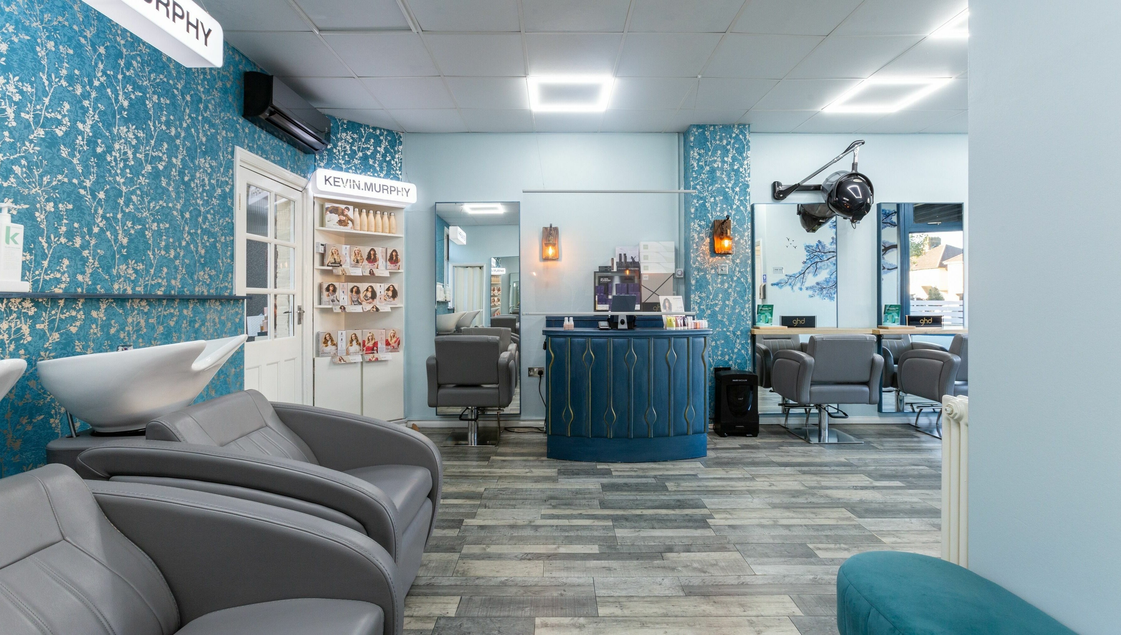 The Beauty Inn in London, England, GB showcases a chic interior with elegant decor and modern salon chairs.