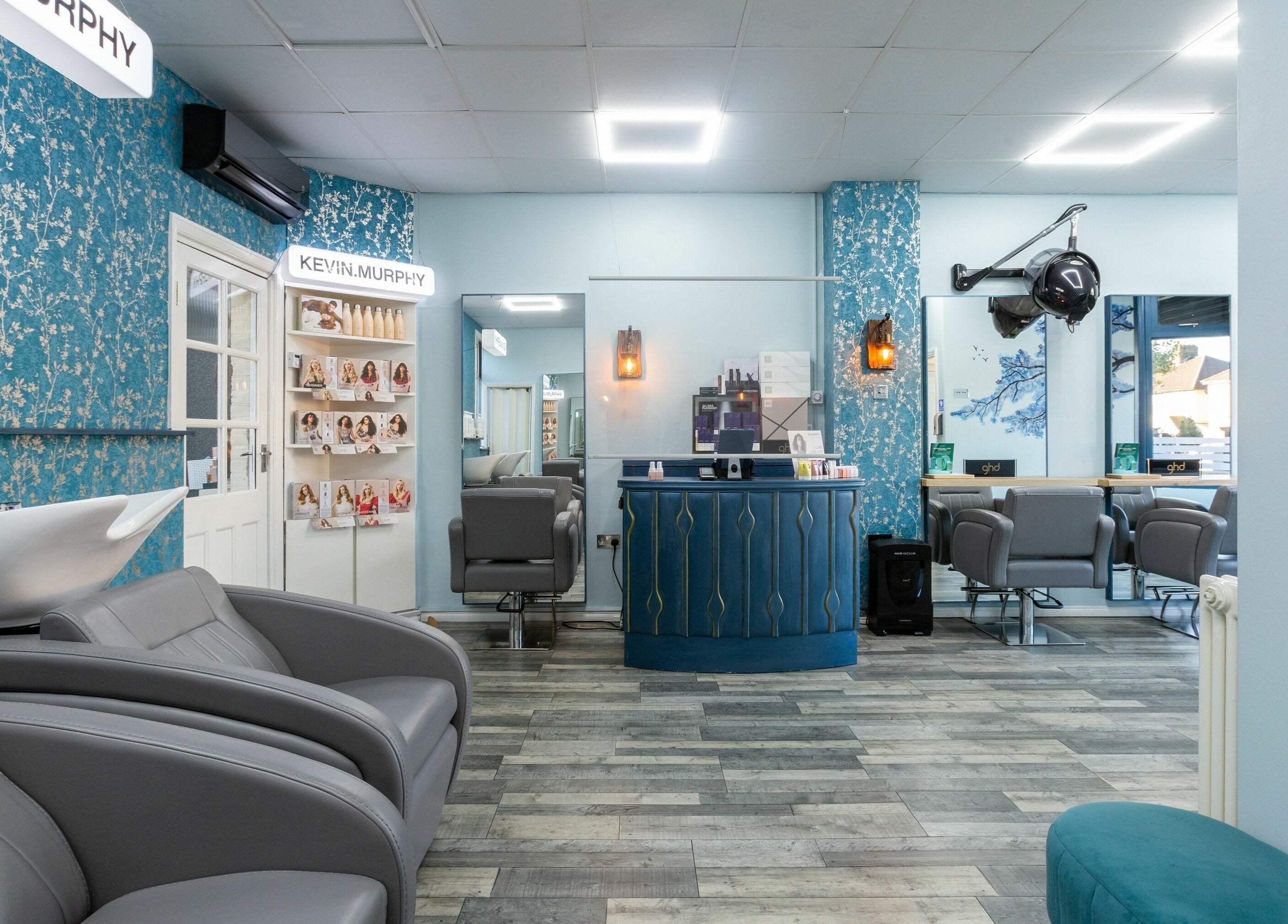 The Beauty Inn in London, England, GB showcases a chic interior with elegant decor and modern salon chairs.