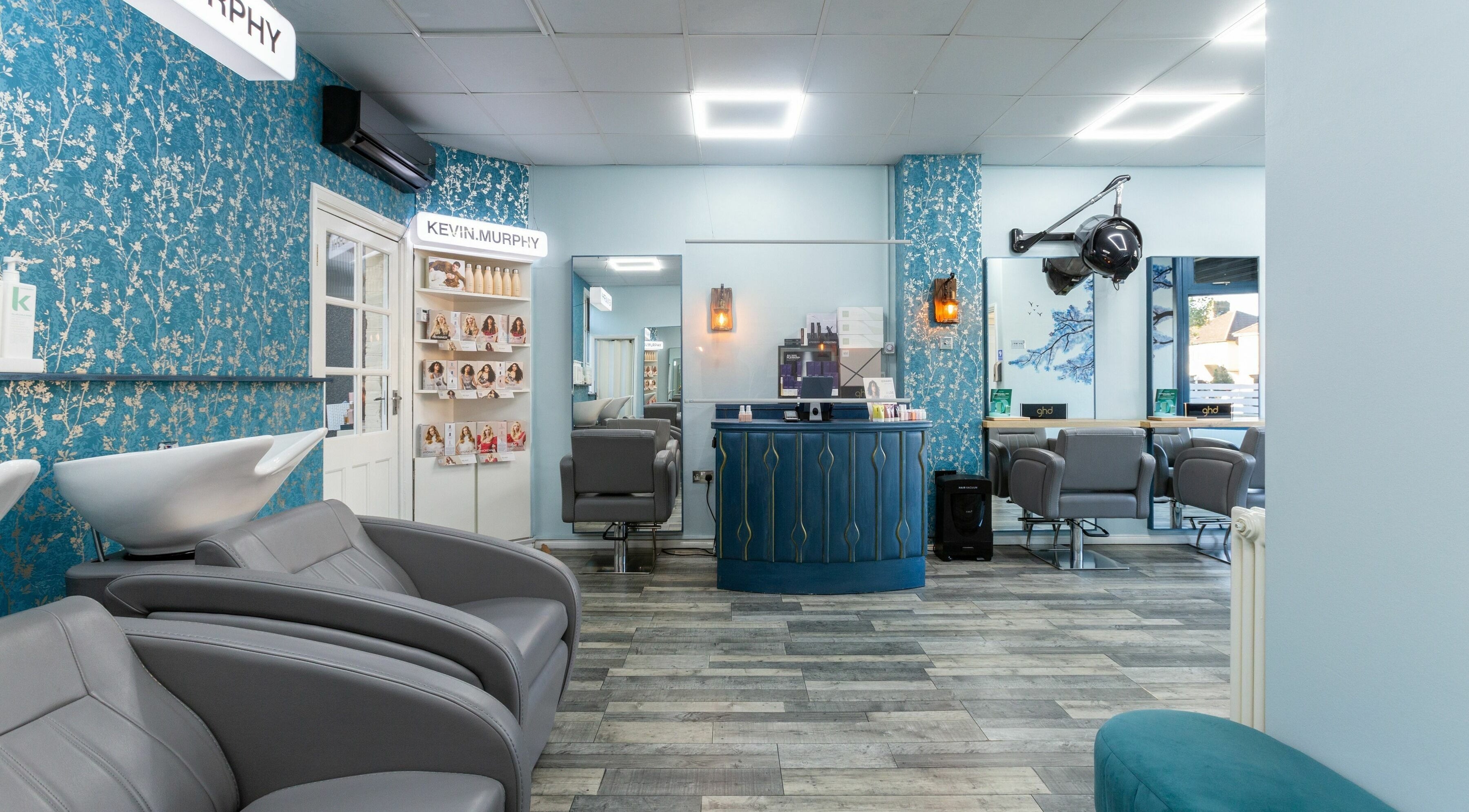 The Beauty Inn in London, England, GB showcases a chic interior with elegant decor and modern salon chairs.