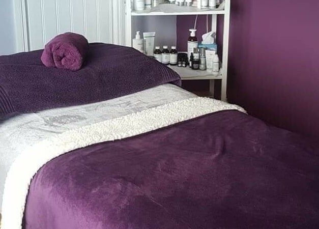 Relaxing massage bed at Maria’s Beauty Haven, County Galway, County Galway, IE. Cozy and inviting spa ambiance.