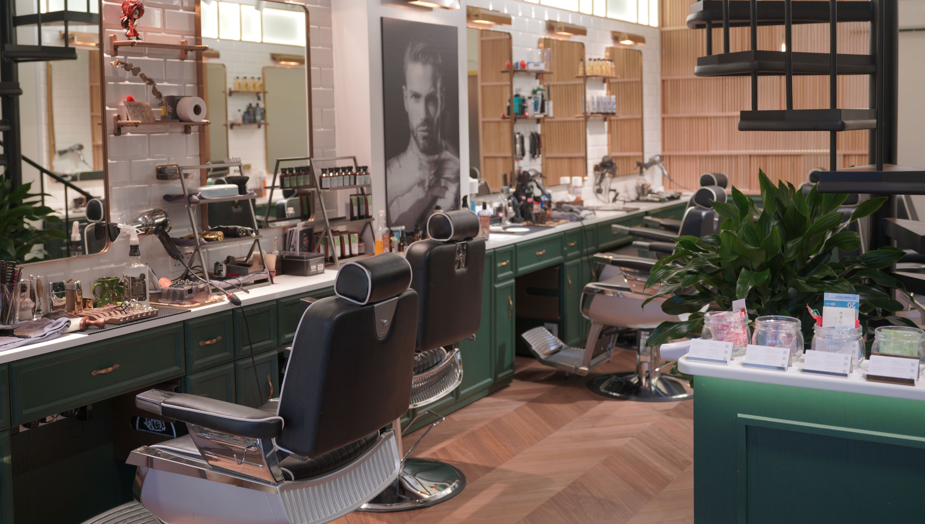 Stylish interior of Canton Barber Wan Chai on Hong Kong Island, HK featuring modern barber chairs and grooming tools.